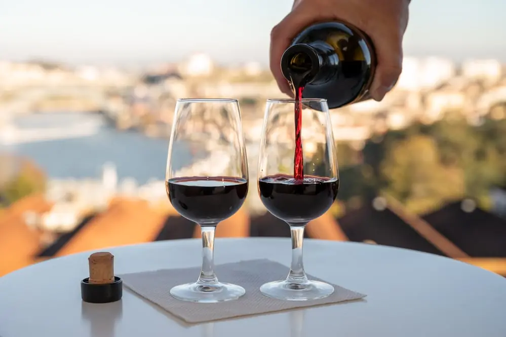 pouring-of-fortified-dessert-ruby-tawny-port-wines-in-glasses-w